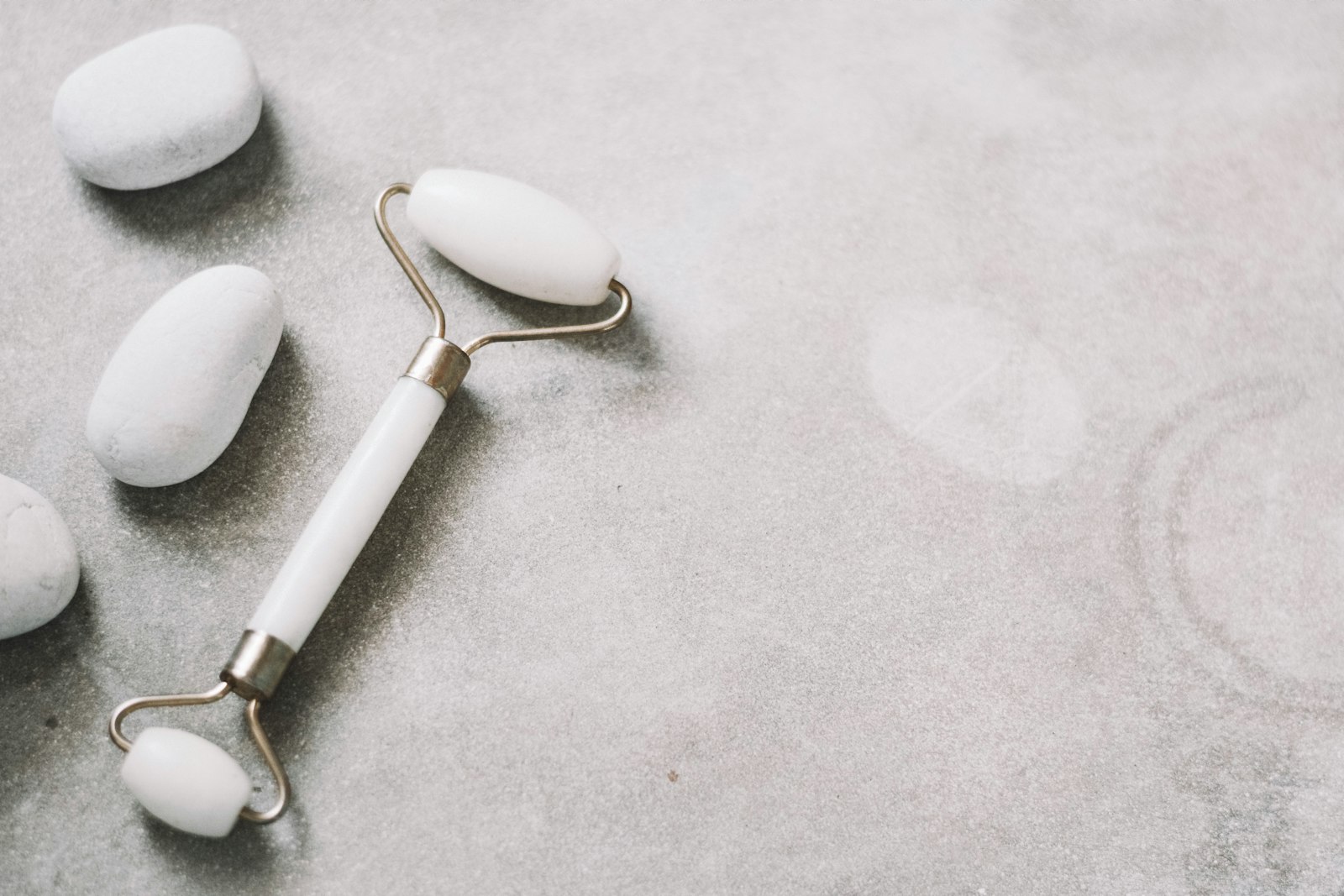 ANGOVO TRADE skincare tools in soft light